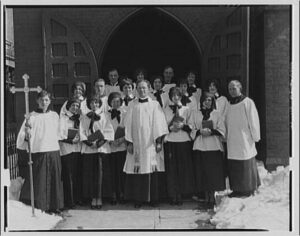 portrait-photographs-episcopal-minister-altar-boy-and-choir-standing-at-entrance-small