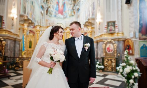 Happy Smiled Wedding Couple After Wedding Registration On Church