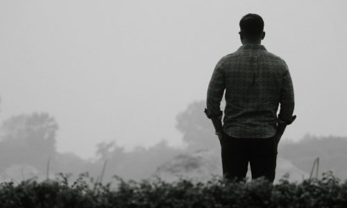 free-photo-of-depressed-man-standing-alone