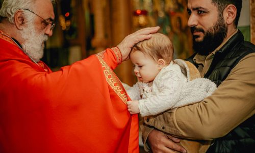 free-photo-of-priest-blessing-a-child