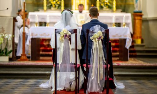 Bride,And,Groom,During,Wedding,Ceremony,In,Church.,Bride,And