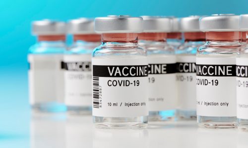 Ampoules,With,Covid-19,Vaccine,On,A,Laboratory,Bench.,To,Fight