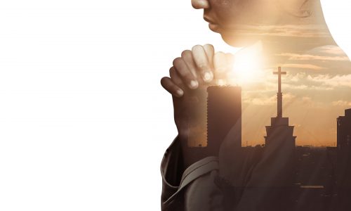 Double,Exposure,Of,A,Hand,Girl,Praying,For,City,,Hands